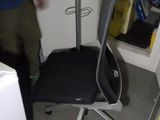 a chair that is sitting in the corner of a room