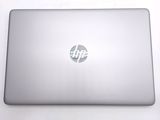 a silver laptop with a hp logo on it