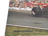 a picture of a book with a picture of a race car on it