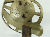 a metal object with a bird on top of it