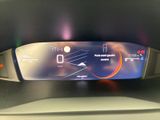 the dashboard of a car with a digital display on it