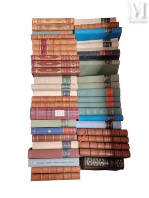 a lot of books stacked on top of each other