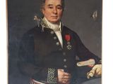portrait d'un homme en uniforme militaire tenant un livre