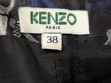 a close up of a label on a jacket that says kenzo paris