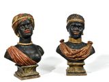 pair of african busts of a man and a woman