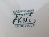 a close up of a plate with a logo on it