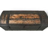 an old wooden chest with a metal latch on the top