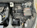 a picture of a car engine with its hood open