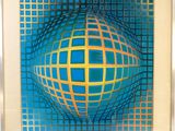 painting of a sphere with a grid pattern in a white frame