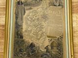 une carte ancienne de l'État du Kentucky, encadrée d'or sur un support en bois