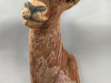 an image of a statue of a goat with horns on it ' s head