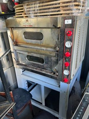 a large oven sitting on top of a table