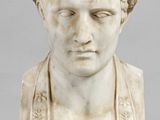 marble bust of a young man wearing a wreathed headdress