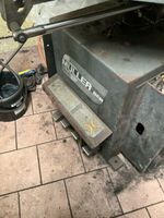 Un démonte-pneus électromécanique de marque MULLER BEM, à co… (photo 2)