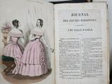 two pages of a book with a picture of two women in pink dresses
