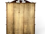 an image of a wooden cabinet with a mirror on top of it