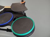 an image of a drum set up in a room