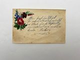a piece of old paper with flowers and writing on it