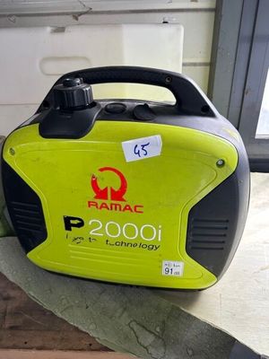 a portable generator that is sitting on the floor