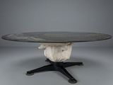 an image of a round table with a black top