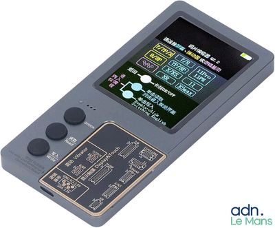 an old game console with buttons and buttons on the screen