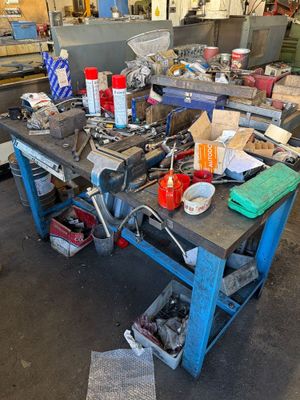 a workbench with a lot of tools on it