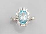 an oval aquamarinee and diamond ring