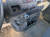 a close up of a car dashboard with a steering control