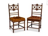 pair of antique wooden chairs with upholstered seat and back cushions