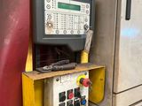 a machine that has a control panel on the side of it