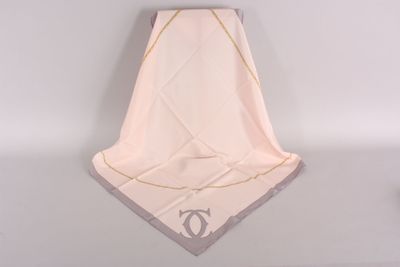 towel with a chanel logo on it hanging on a wall