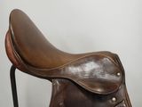 an image of a close up of a saddle on a chair