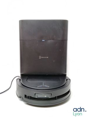 a small black device on top of a black stand