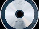 a picture of a black diamond blade on a black background