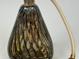 two vases that are sitting next to each other on a table
