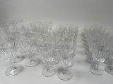 a lot of empty wine glasses on the table
