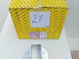 the box is sitting on a table with a piece of paper in it