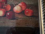 a picture of a painting of cherries on a table