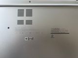 a close up of a laptop with the back panel missing