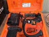 an orange tool box with tools inside of it
