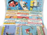 a lot of children ' s books on display on a table