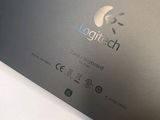 the back side of a laptop with a logo on it