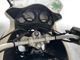 a close up view of a motorcycle ' s dashboard and handlebars