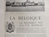 an old newspaper with a picture of a city and a boat
