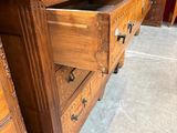 a wooden desk with a laptop on top of it