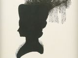 a black and white photo of a silhouette of a woman with a hairdo
