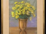 painting of yellow flowers in a gold vase on a table