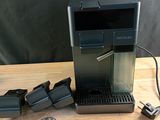 a coffee machine that is sitting on a wooden table
