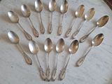 a lot of spoons that are sitting on a table