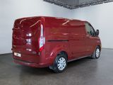 a picture of a red van parked in a garage